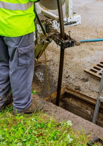 Cleaning the sewer system special equipment on utility service in the town.