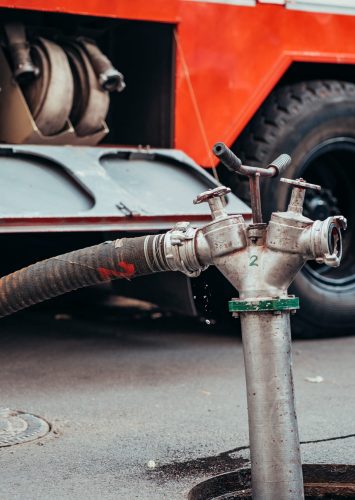 Fire Hydrant In Use During a Structure Fire